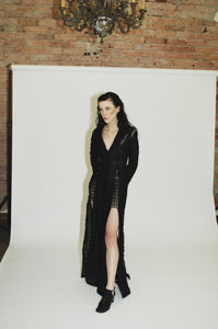 Elegant long sleeve black evening dress for a glamorous loo