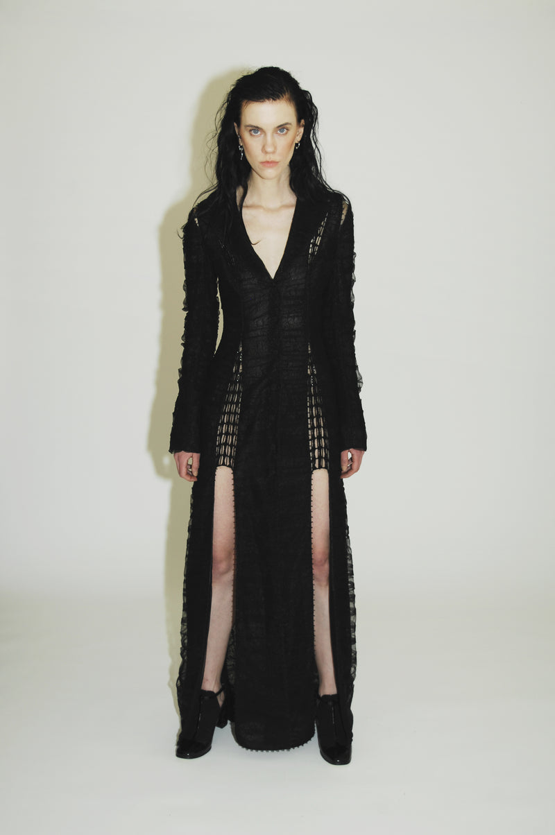 Elegant long sleeve black evening dress for a glamorous look
