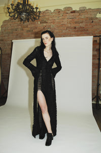 Elegant long sleeve black evening dress for a glamorous look