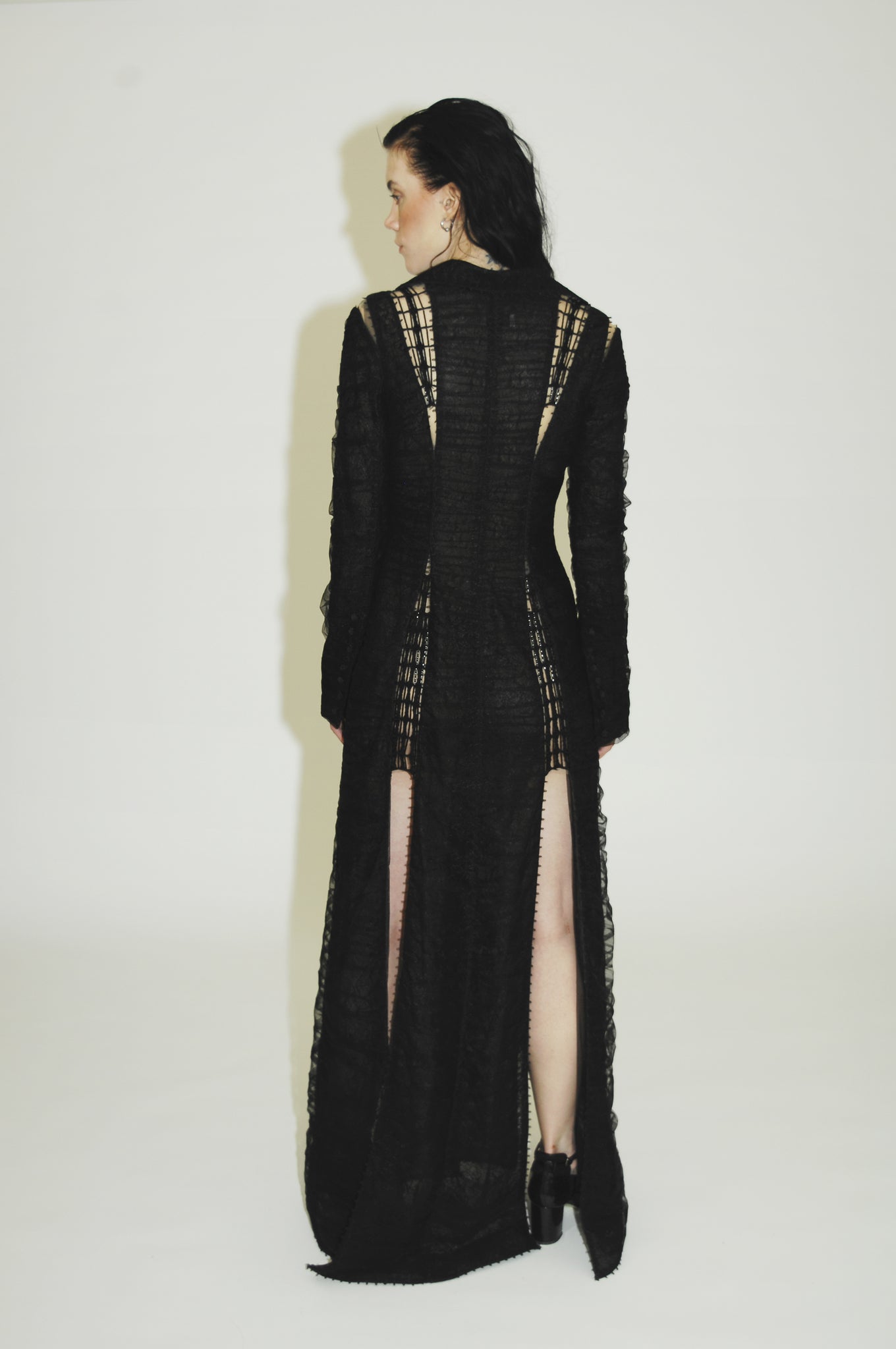 Elegant long sleeve black evening dress for a glamorous look