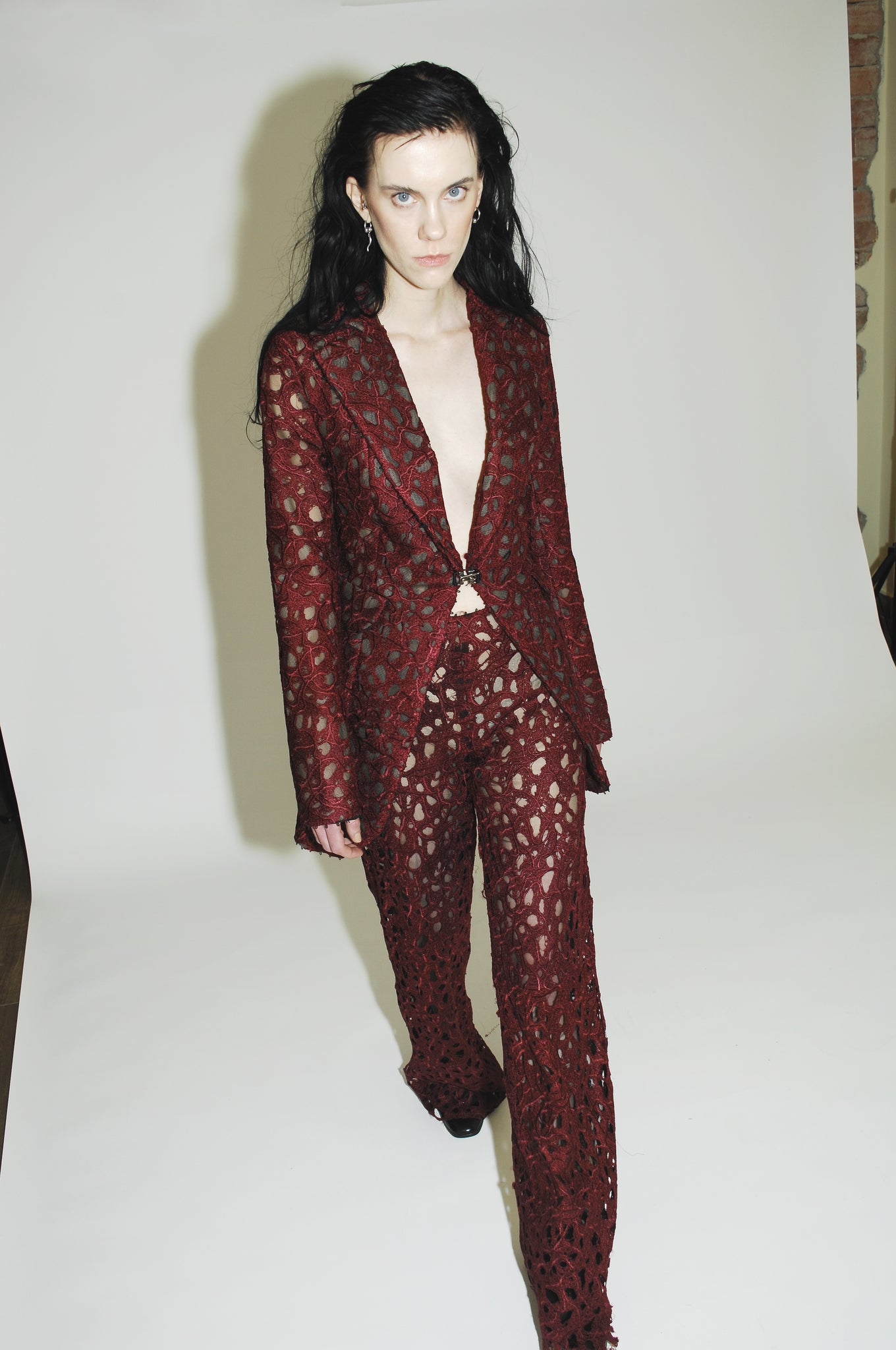 Tailored jacked with ensemble featuring a heart-inspired textile on the jacket and pants
