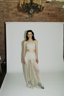 Special occasions or a night out fashion-forward outfit with intricate design and unique details. Greige.