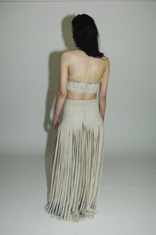 Special occasions or a night out fashion-forward outfit with intricate design and unique details. Greige.
