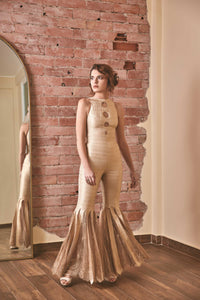 RoubaG's gold-ivory flared pants jumpsuit with honeycomb cuts and open back