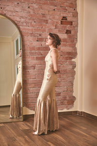 RoubaG's gold-ivory flared pants jumpsuit with honeycomb cuts and open back