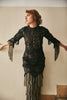 Elegant lace dress with intricate fringes, offering a blend of sophistication and trendiness. Designed for ladies who appreciate unique fashion and desire a standout look for formal events
