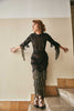 Elegant lace dress with intricate fringes, offering a blend of sophistication and trendiness. Designed for ladies who appreciate unique fashion and desire a standout look for formal events