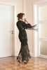 Elegant lace dress with intricate fringes, offering a blend of sophistication and trendiness. Designed for ladies who appreciate unique fashion and desire a standout look for formal events