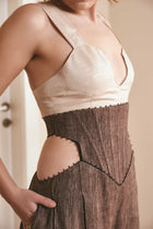 Sustainable fashion choice: Distorted brown wool pants with corset waist and side pockets - Ethical clothing option for conscious consumers